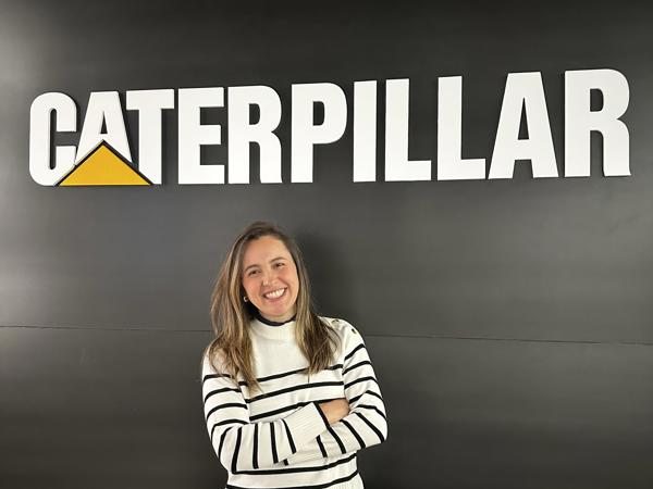 a person standing in front of a sign