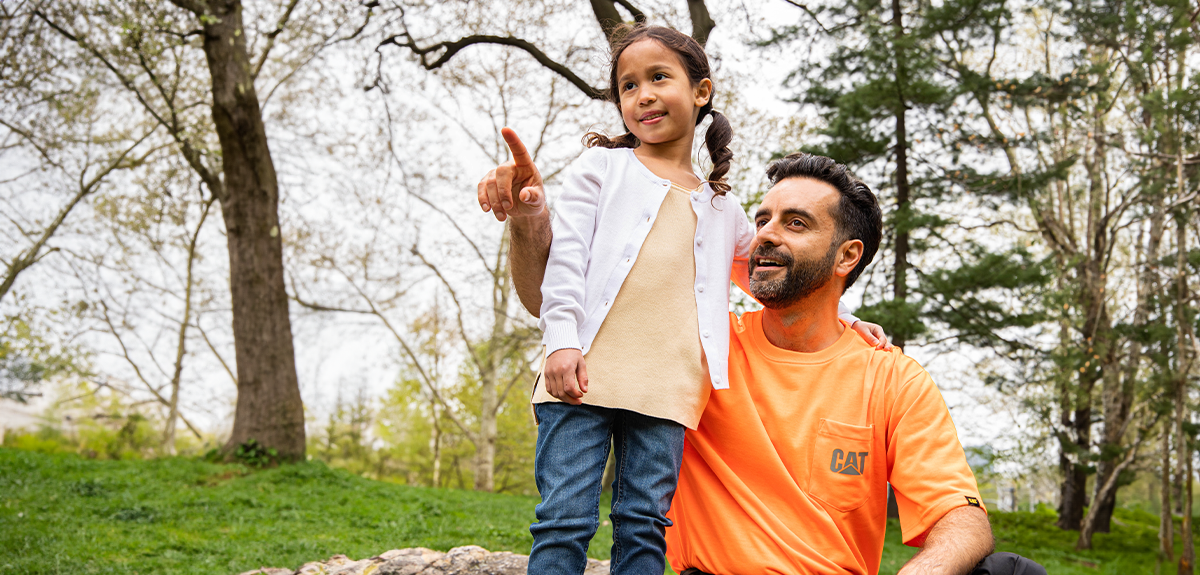 a person and a child pointing at something