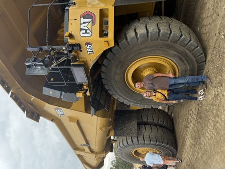 Chaille in front of Cat 785