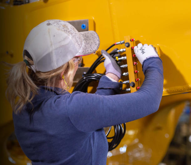 a person wearing a hat and glasses