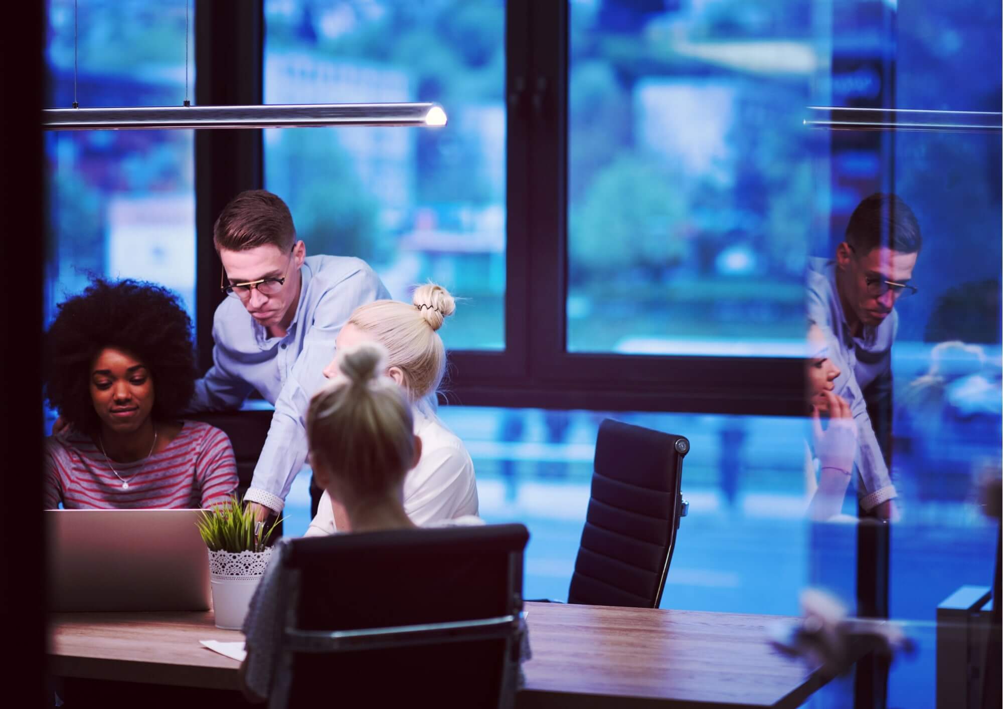 4 People In Boardroom