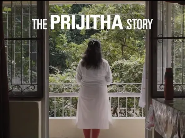 a person standing in front of a window